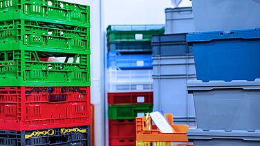 Stacked cratings in different colors.