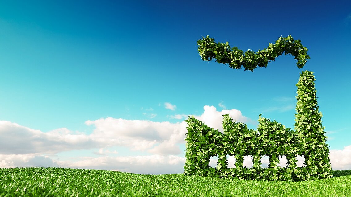A stylized factory of green leaves against a blue sky.