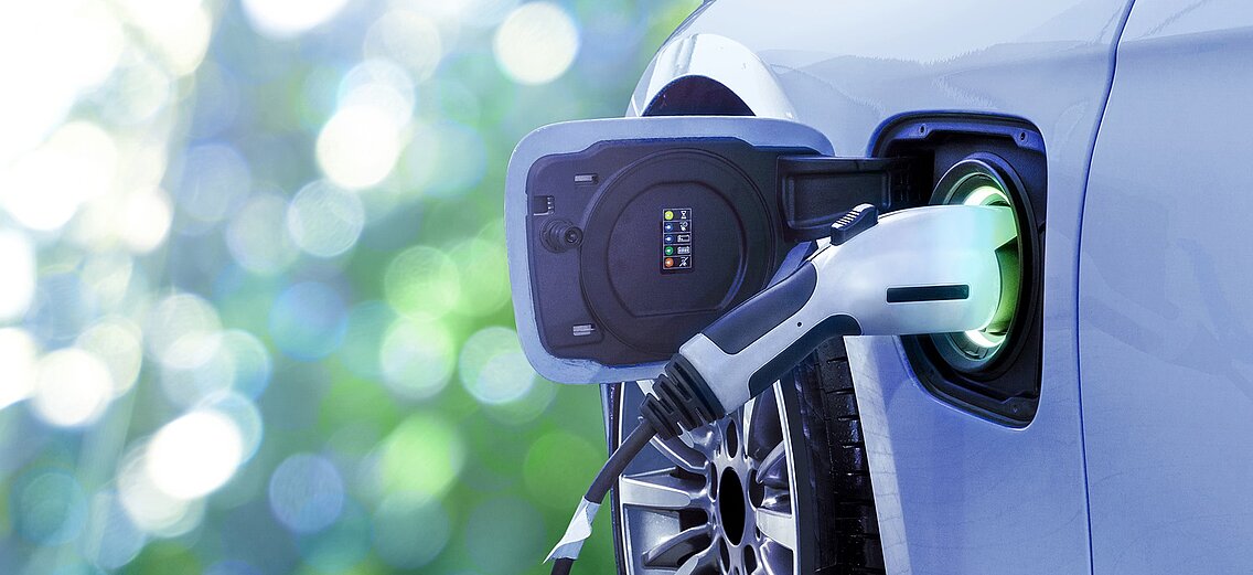 Charging an electric vehicle.