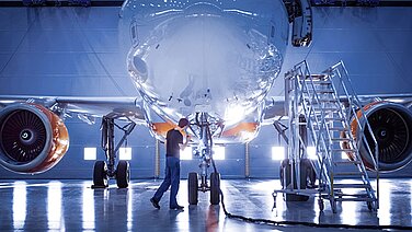 Airplane in a production hall.