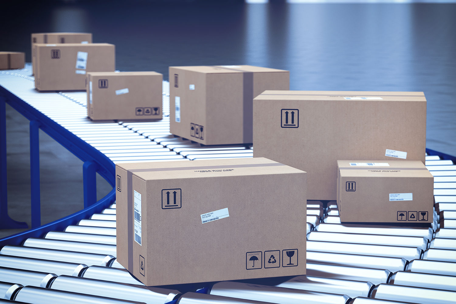 View of several small parcels on a conveyor belt.