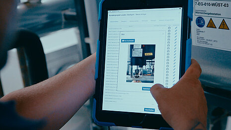Someone is using the LARA app for digital asset recording on a tablet.
